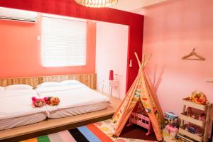 Postel nebo postele na pokoji v ubytování Happy B&B