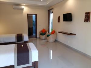 TV/Unterhaltungsangebot in der Unterkunft Darra Ria Villa Ubud
