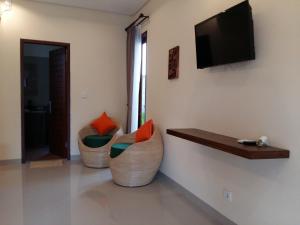 TV/Unterhaltungsangebot in der Unterkunft Darra Ria Villa Ubud