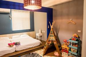 Postel nebo postele na pokoji v ubytování Happy B&B