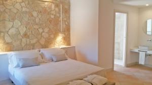Posteľ alebo postele v izbe v ubytovaní Giotto Country House & Spa