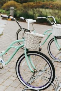 two bikes parked next to each other on a sidewalk at Chebeague Island Inn in Royal Junction