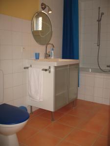 Kylpyhuone majoituspaikassa Appartement Les Iris