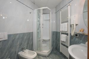 Koupelna v ubytování SIRIOHotel