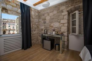 Kuchyňa alebo kuchynka v ubytovaní Spalato Luxury Rooms
