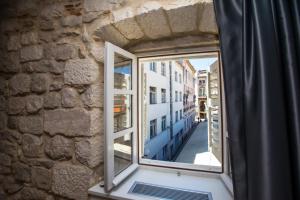 an open window with a view of a street at Spalato Luxury Rooms in Split