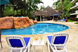 Bazén v ubytování Hotel Casa Iguana Mismaloya nebo v jeho okolí