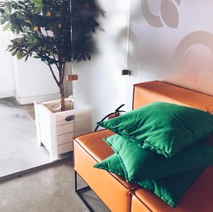 Posezení v ubytování Orange Hotel