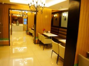 Zona de estar de Goldmet Inn South Loop armed, Datong