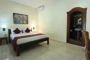 Postel nebo postele na pokoji v ubytování Nara Ubud Cottage by Mahaputra + 37 fotografií