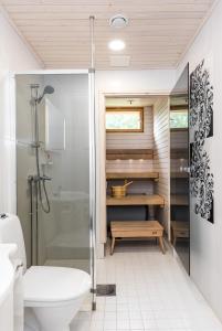 Ett badrum på Apartment Kievarinhovi