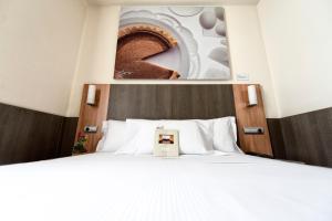 Cama o camas de una habitación en Maisonnave