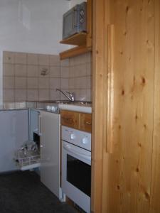 Kuchyňa alebo kuchynka v ubytovaní Gästehaus Grünbacher