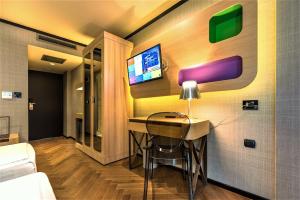A television and/or entertainment centre at Eurostars Sofia City
