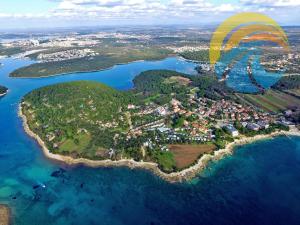 an aerial view of a small island in the water at Apartment Loredana 1209 in Banjole