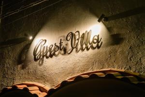 a wall with a sign that says ghost alley on it at Guest Villa Hakone Yumoto 201 in Hakone