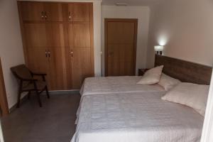 Postel nebo postele na pokoji v ubytování Hostal Soledao