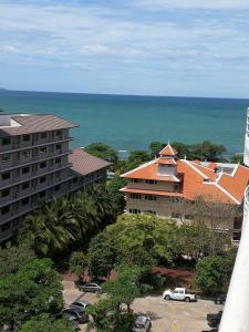 a view of a city with a building and the ocean at Studio View Talay 5C in Pattaya South
