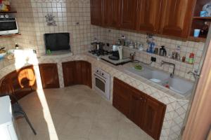 Kuchyň nebo kuchyňský kout v ubytování B&B Parcomonsignore