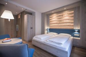 Voodi või voodid majutusasutuse Hotel Garni Andrianerhof toas