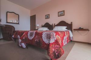 A bed or beds in a room at Residencial Familia