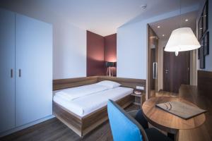 Voodi või voodid majutusasutuse Hotel Garni Andrianerhof toas
