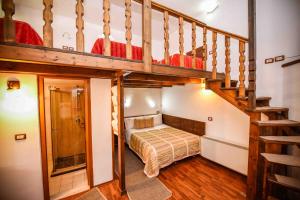 Voodi või voodid majutusasutuse Hotel Tradita toas