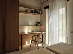 A bed or beds in a room at Niova Villa - Seafront, private pool and Ionian Sea Views, by ZanteWize