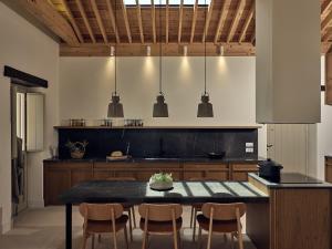 A kitchen or kitchenette at Niova Villa - Seafront, private pool and Ionian Sea Views, by ZanteWize
