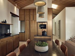 A kitchen or kitchenette at Niova Villa - Seafront, private pool and Ionian Sea Views, by ZanteWize