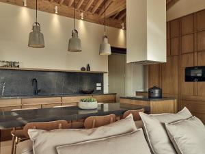 A kitchen or kitchenette at Niova Villa - Seafront, private pool and Ionian Sea Views, by ZanteWize