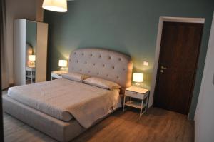 Tempat tidur dalam kamar di Il Casale dei Nonni