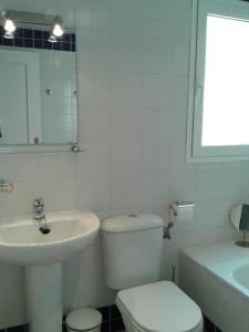 Kylpyhuone majoituspaikassa Apartment Attico