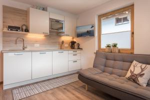 Kuchyň nebo kuchyňský kout v ubytování Alpen Appartement BelEtage