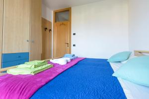 Postel nebo postele na pokoji v ubytování B&B agli Ulivi