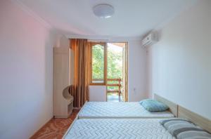 Voodi või voodid majutusasutuse Hotel Forest Fairy toas