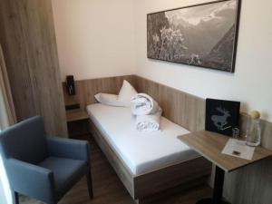 Postel nebo postele na pokoji v ubytování Hotel Möderle