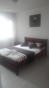 Letto o letti in una camera di Hotel Joohn Gay only LGBTIQ