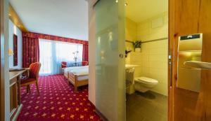 Vannituba majutusasutuses Hotel Excelsior