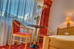 Voodi või voodid majutusasutuse Hotel Excelsior toas