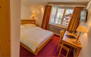 TV a/nebo společenská místnost v ubytování Hotel Excelsior + 37 fotografií