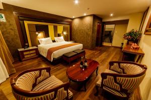 Letto o letti in una camera di Yawar Inka Hotel
