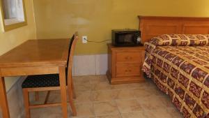 Letto o letti in una camera di Luxury Inn
