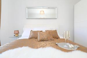 Postel nebo postele na pokoji v ubytování Apartments Tija Exclusive
