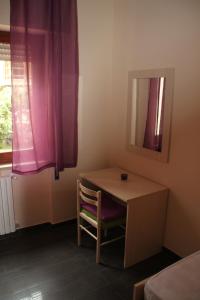 A bed or beds in a room at Un Posto Al Sole