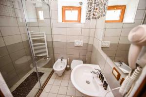 Vannituba majutusasutuses Hotel Tradita