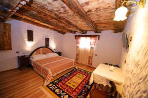 Voodi või voodid majutusasutuse Hotel Tradita toas