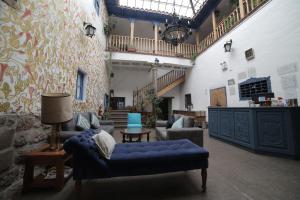Uma área de estar em Posada Villa Mayor