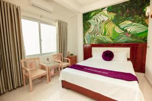 Giường trong phòng chung tại Dang Quang Guesthouse