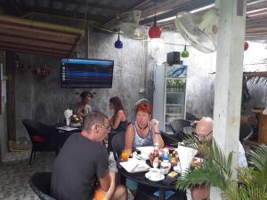 A restaurant or other place to eat at B Happy Resort - SHA ExtraPlus
